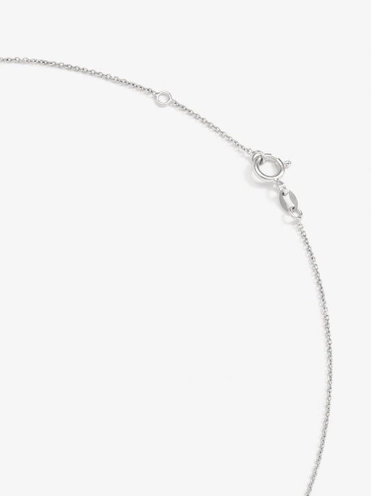 Colgante de oro blanco de 18K con esmeralda y diamantes en talla brillante con un total de 0,15 cts