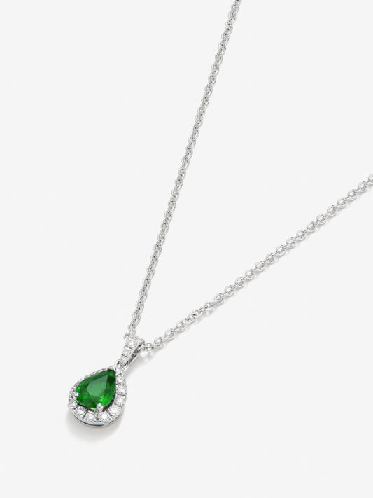 Colgante de oro blanco de 18K con esmeralda y diamantes en talla brillante con un total de 0,15 cts