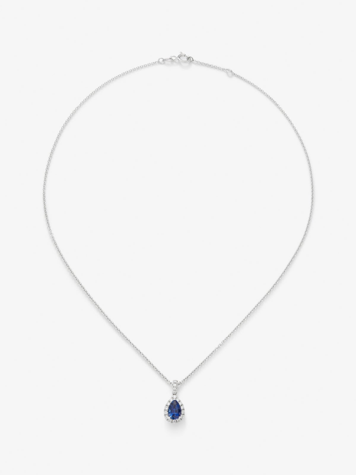 Colgante de oro blanco de 18K con zafiro azul