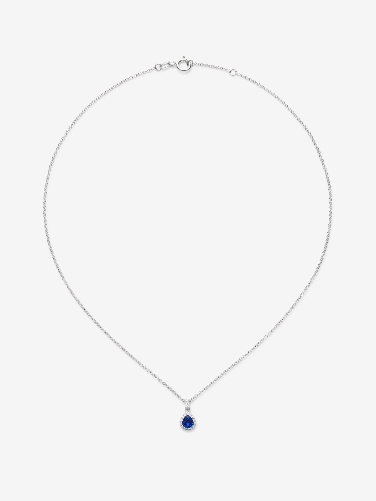 Colgante de oro blanco de 18K con zafiro azul