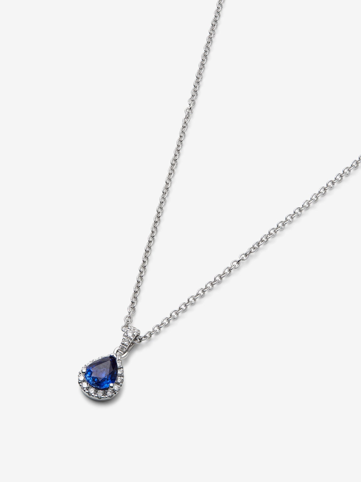 Colgante de oro blanco de 18K con zafiro azul