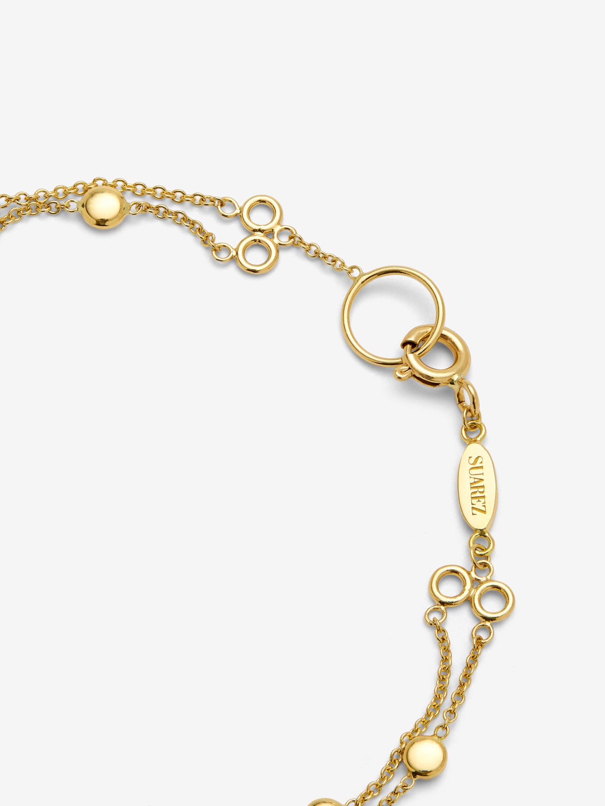 Pulsera doble de oro amarillo de 18K