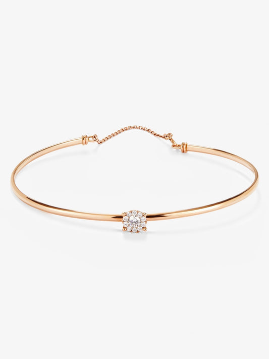 Pulsera rígida de oro rosa de 18K con 11 diamantes en talla brillante con un total de 0,21 cts