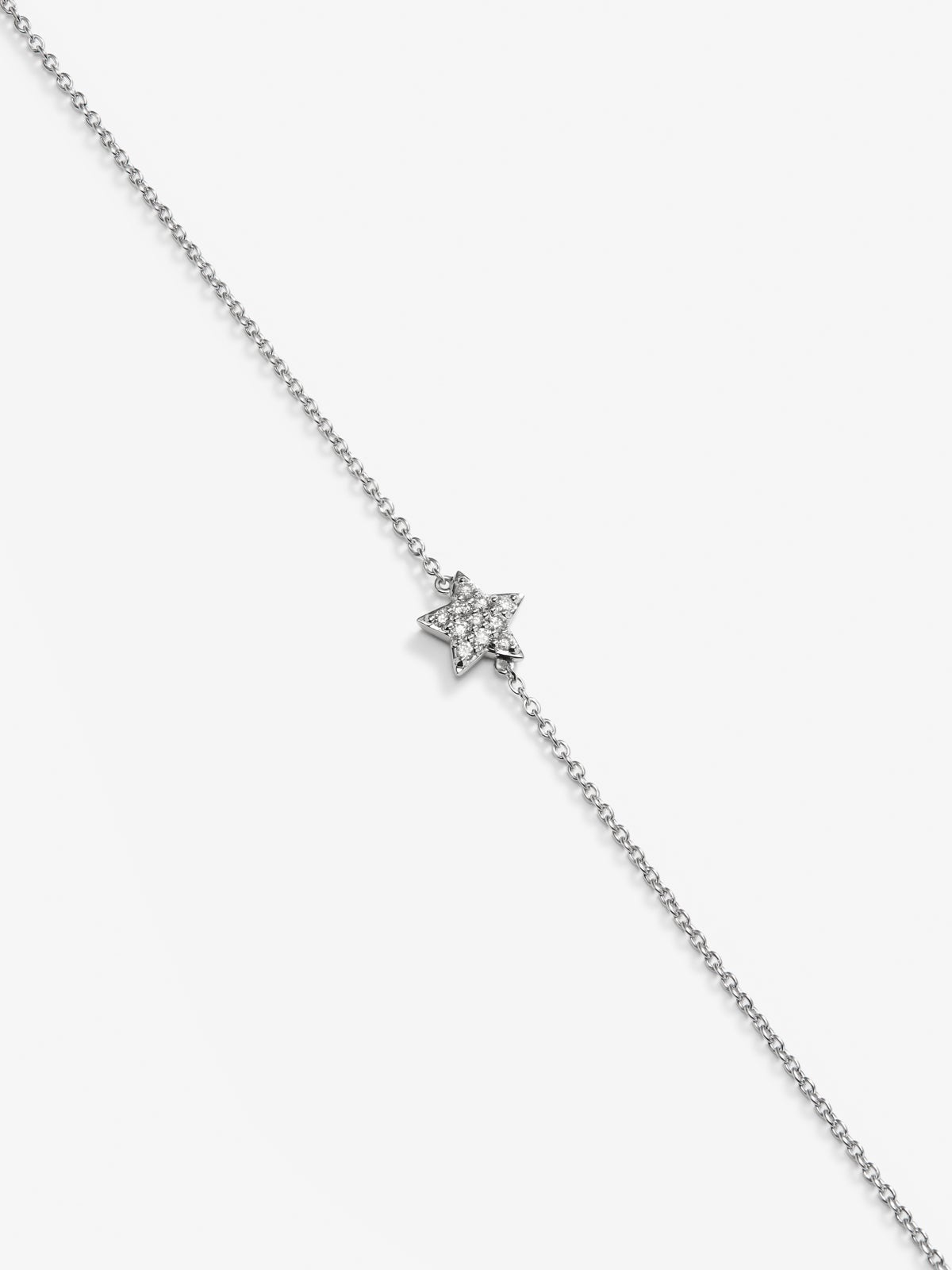 Pulsera de oro blanco de 18K con diamantes blancos en talla brillante de 0,05 cts con forma de estrella