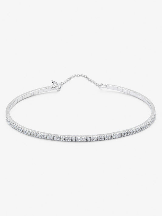 Pulsera rígida de oro blanco de 18K con diamantes blancos en talla brillante de 0,39 cts