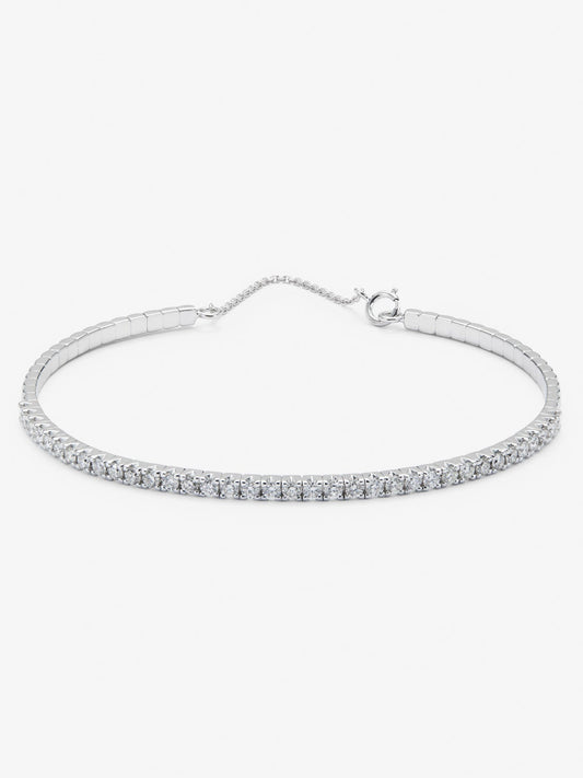 Pulsera rígida de oro blanco de 18K con diamantes blancos en talla brillante de 1,04 cts