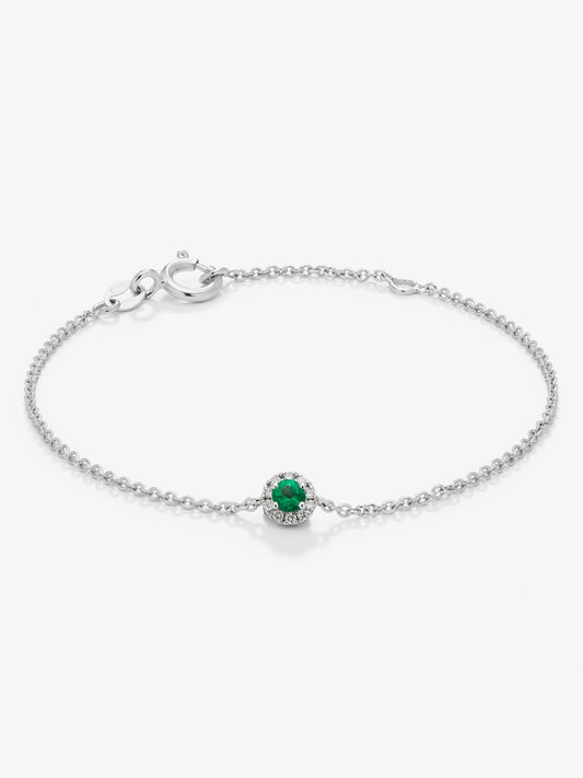 Pulsera de oro blanco de 18K con esmeralda en talla brillante de 0,1 cts y diamantes en talla brillante de 0,05 cts