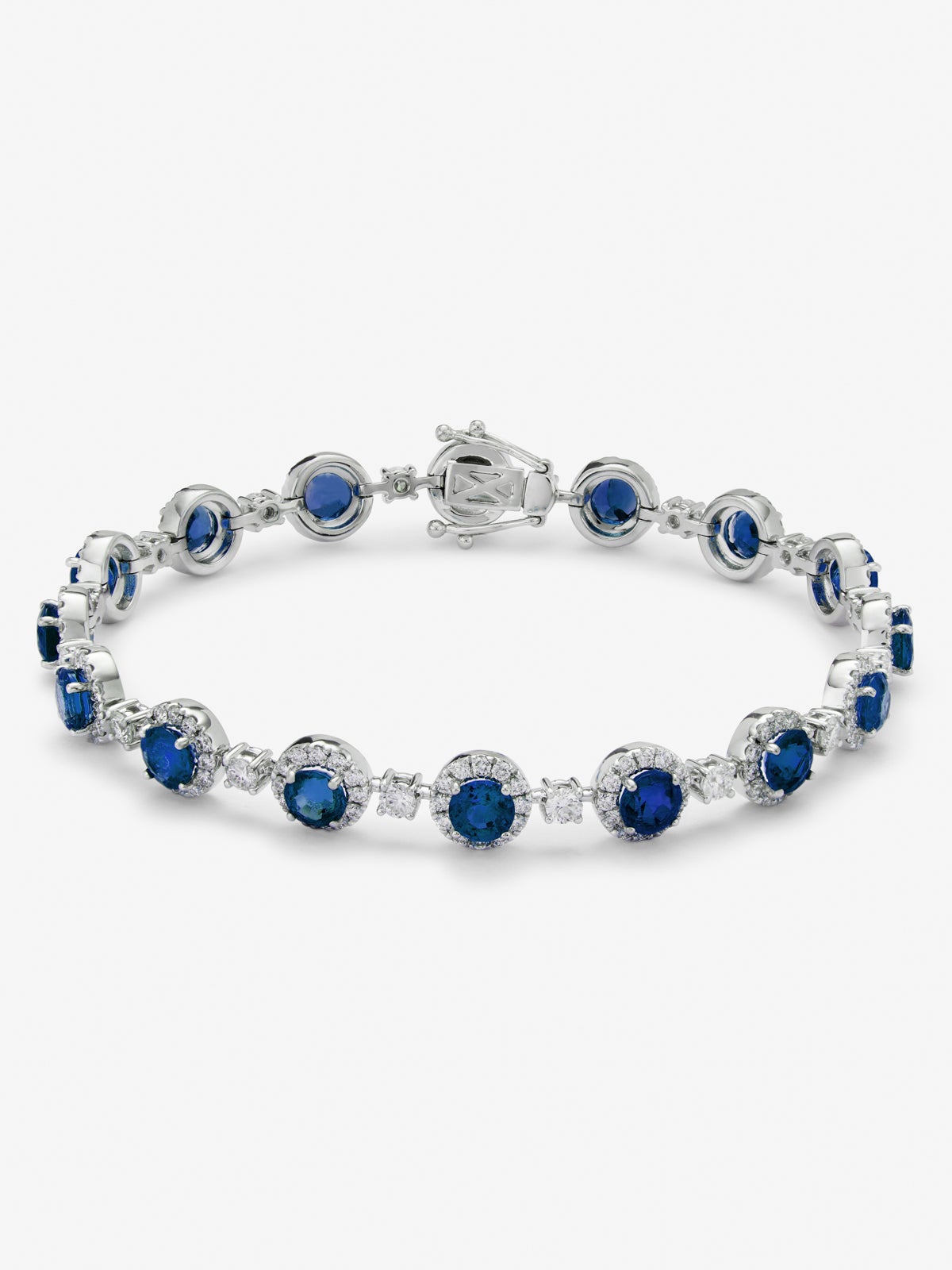 Pulsera rivière de oro blanco de 18K con zafiros azules en talla brillante de 3,95 cts y diamantes blancos en talla brillante de 2,3 cts