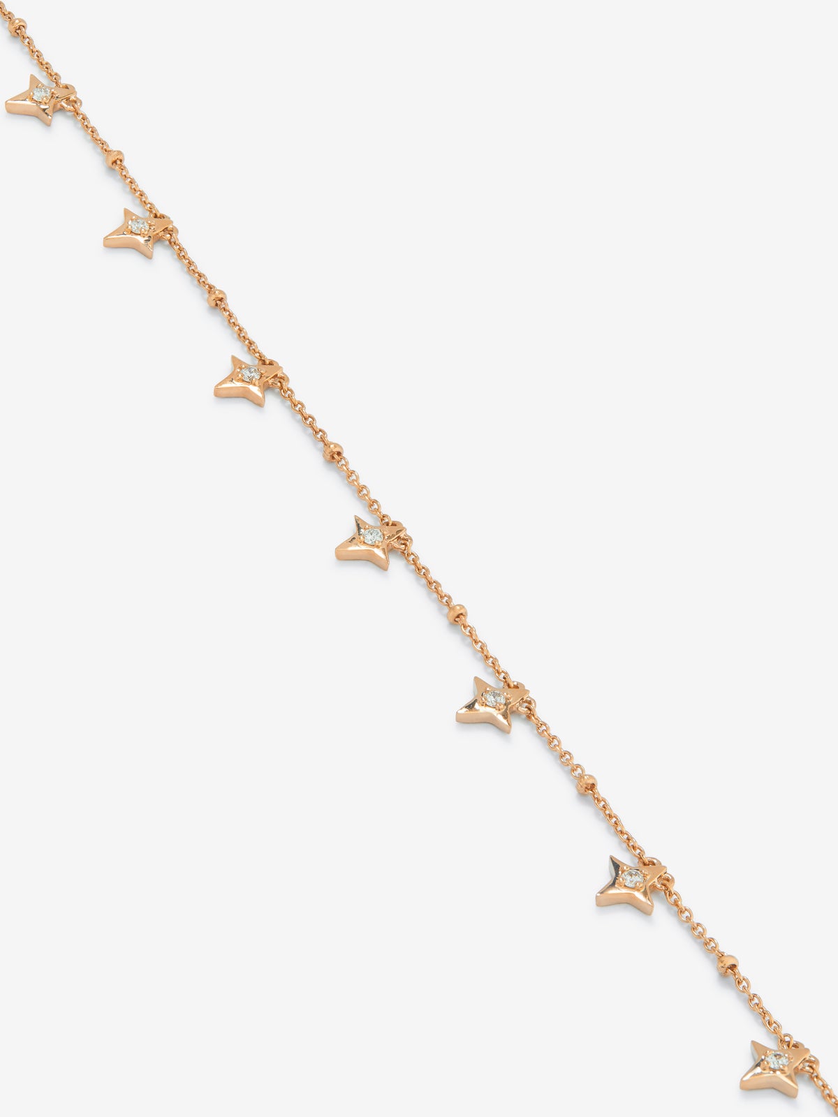 Pulsera cadena con estrellas de oro rosa de 18K con diamantes