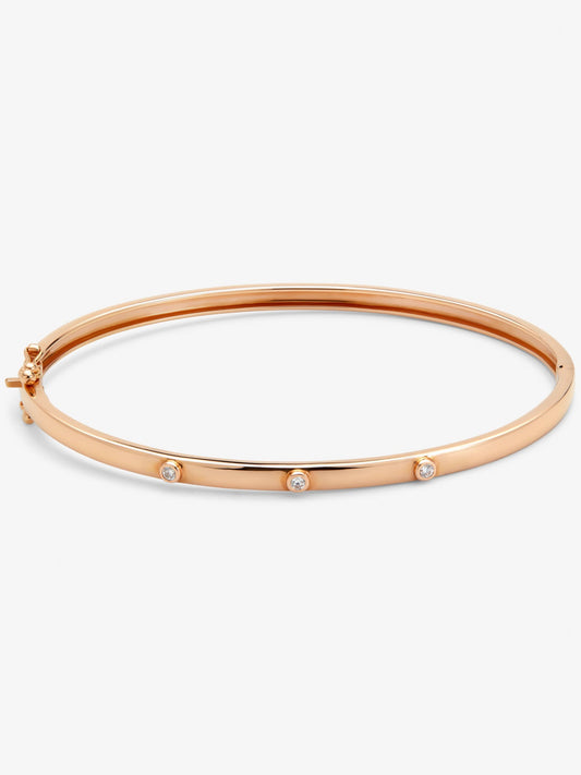 Pulsera rígida de oro rosa de 18K con diamantes en talla brillante de 0,07 cts