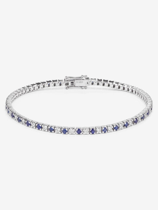 Pulsera de oro blanco de 18K con 37 diamantes en talla brillante con un total de 0,88 cts y 38 zafiros azules en talla brillante con un total de 0,95 cts