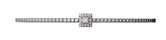 Pulsera de oro blanco de 18K con diamante en talla princesa de 0,16 cts y diamantes en talla brillante con un total de 0,67 cts