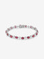 Pulsera rivière de oro blanco de 18K con rubíes rojos en talla oval de 10,16 cts y diamantes blancos en talla princesa de 2,69 cts