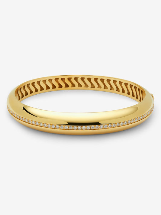 Pulsera rígida de oro amarillo de 18K con pavé de diamantes en talla brillante