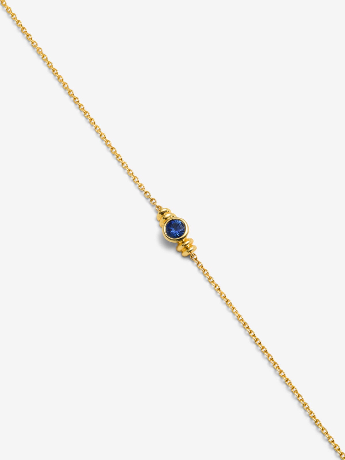 Pulsera de oro amarillo de 18K con zafiro en talla brillante de 0,1 cts