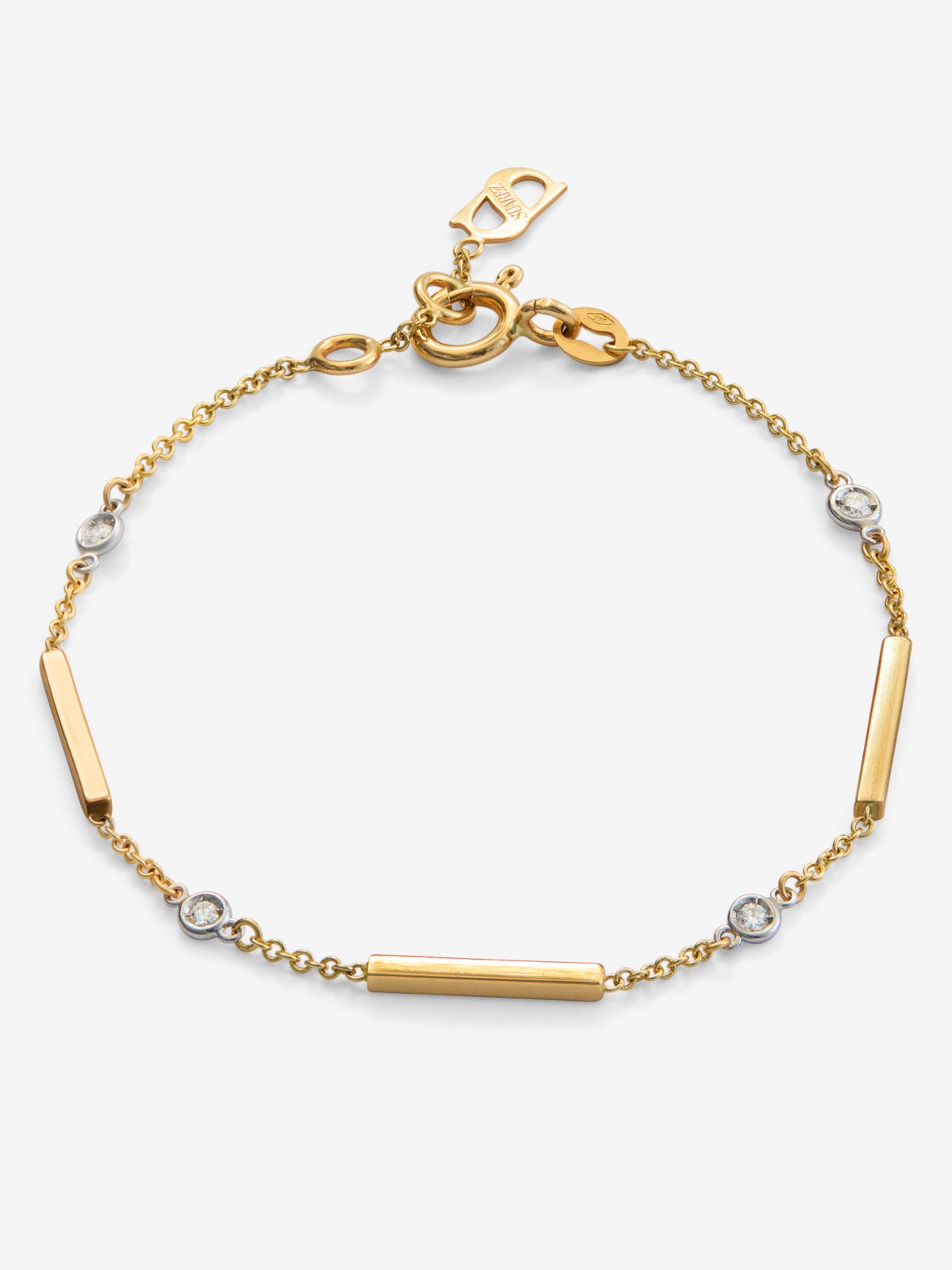 Pulsera de oro amarillo de 18K con 4 diamantes en talla brillante con un total de 0,1 cts