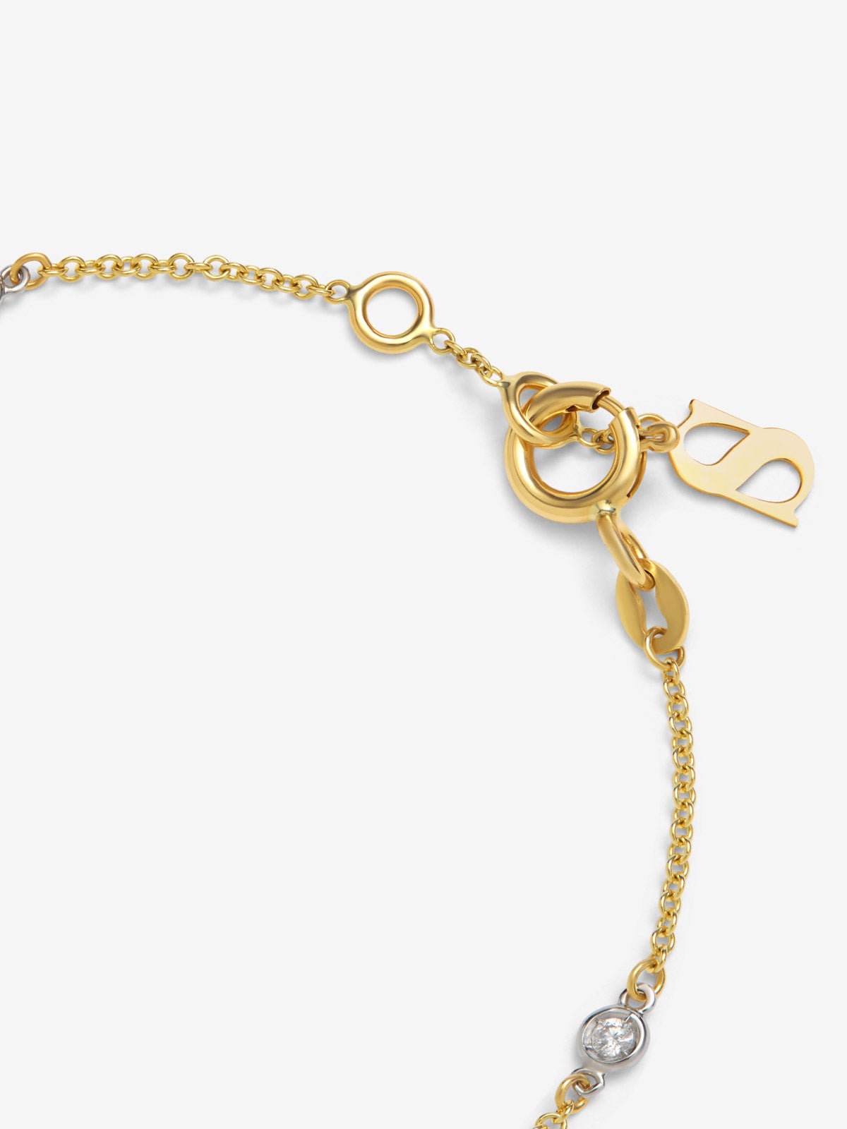Pulsera de oro amarillo de 18K con 4 diamantes en talla brillante con un total de 0,1 cts