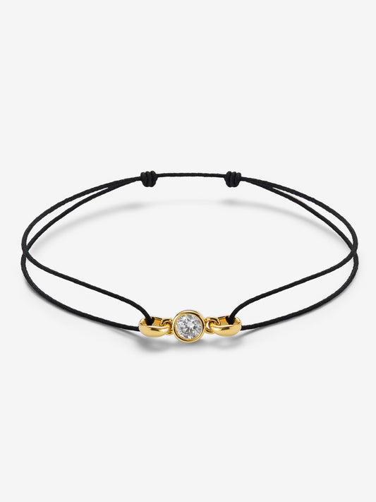 Pulsera de oro amarillo de 18K con diamante en talla brillante de 0,4 cts 