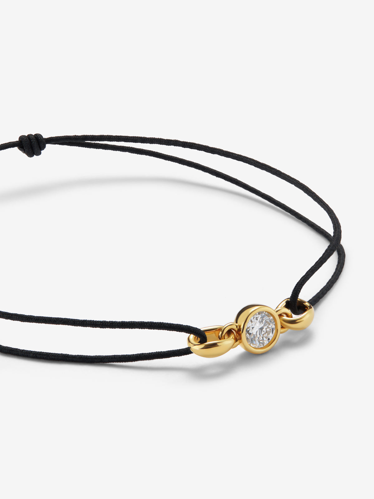 Pulsera de oro amarillo de 18K con diamante en talla brillante de 0,4 cts 