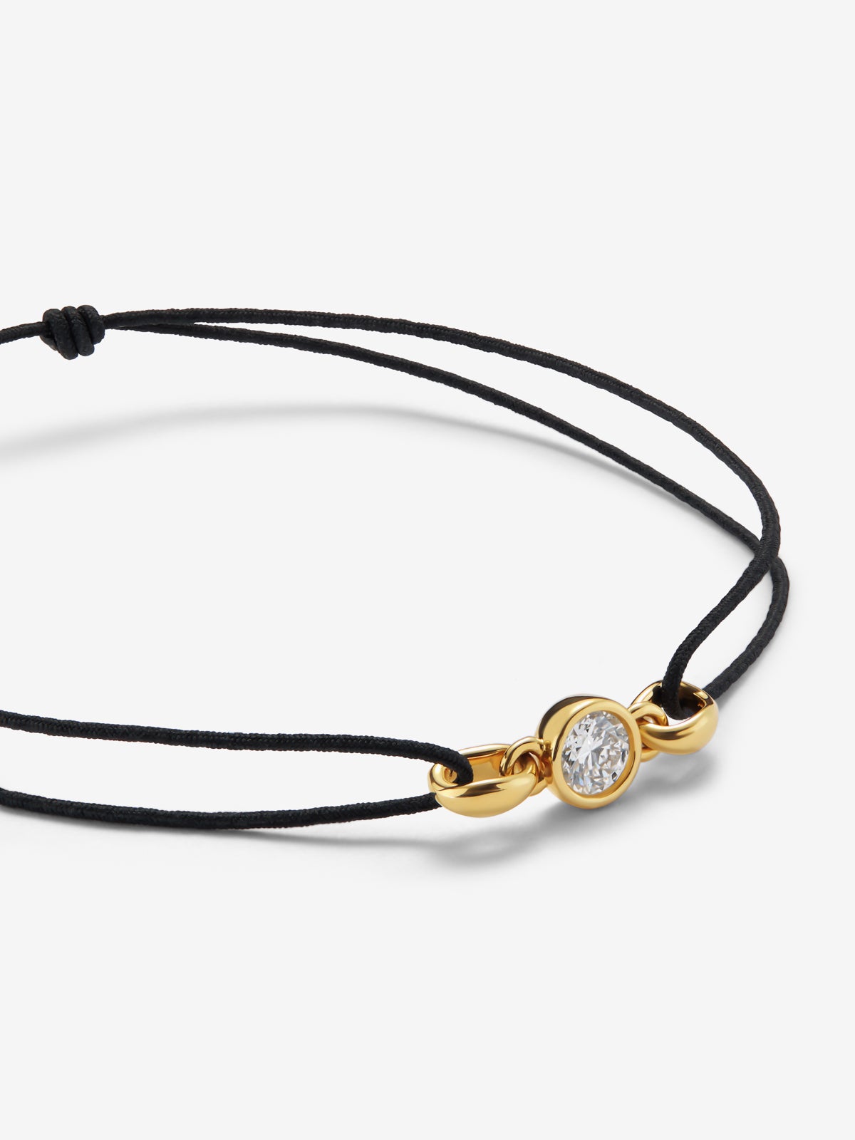 Pulsera de oro amarillo de 18K con diamante en talla brillante de 0,4 cts 