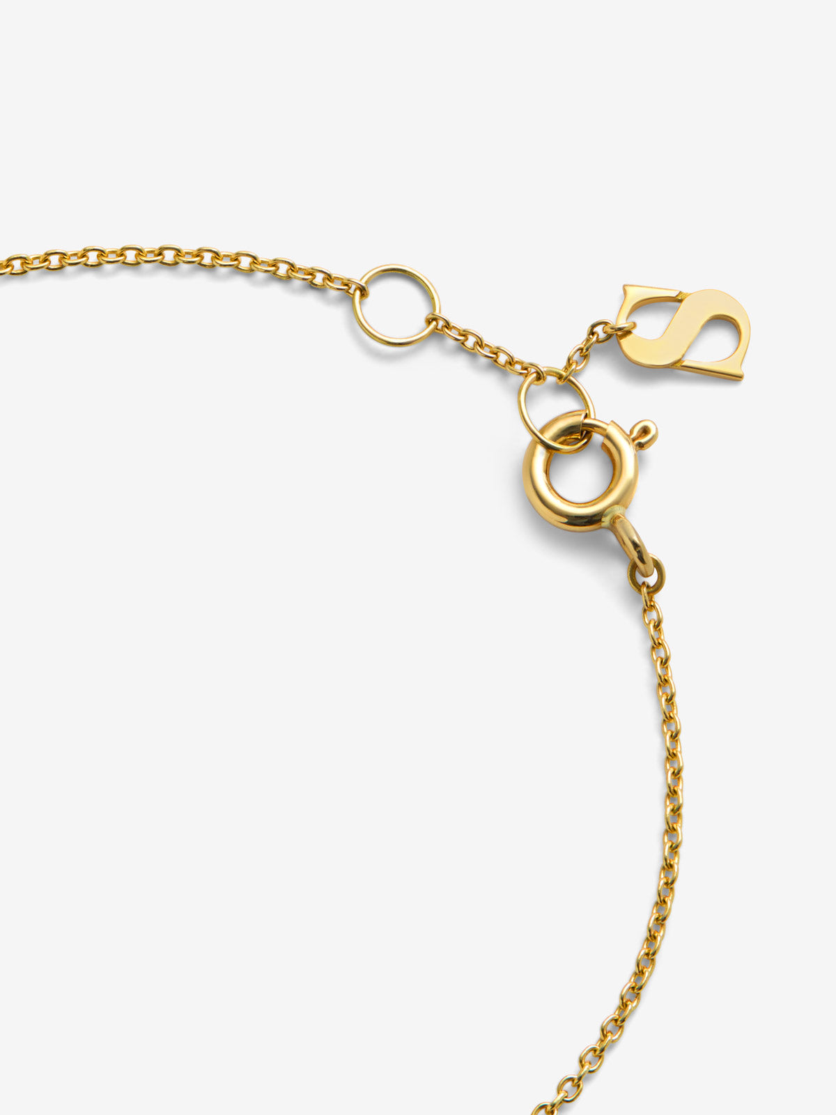 Pulsera de oro amarillo de 18K con zafiro azul en talla brillante de 0,15 cts