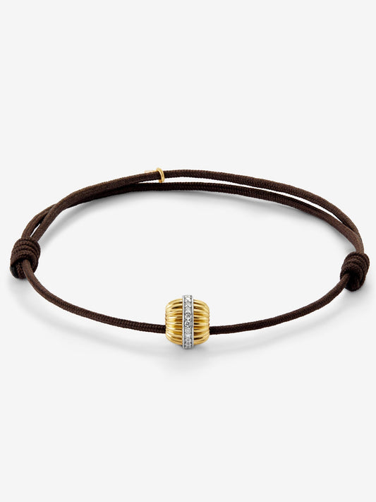 Pulsera gallonada de oro blanco y amarillo de 18K con pavé de diamantes en talla brillante con un total de 0,11 cts