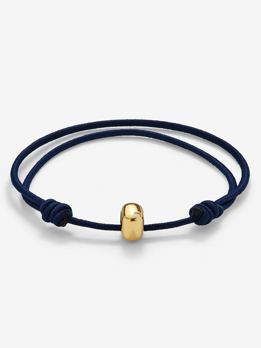 Pulsera de oro amarillo de 18K con 2 diamantes en talla brillante con un total de 0,03 cts