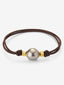 Pulsera one con perla tahití y detalles de oro amarillo de 18K