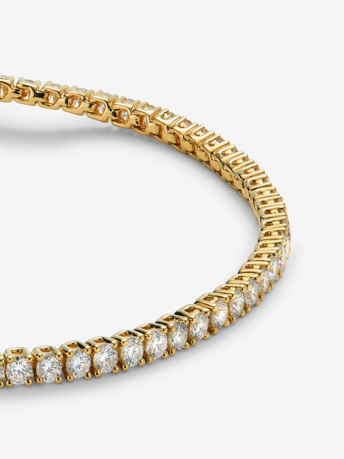 Pulsera rivière de oro amarillo de 18K con diamantes blancos en talla brillante de 2,5cts