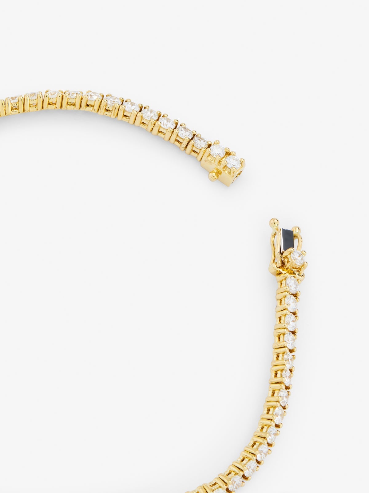 Pulsera rivière de oro amarillo de 18K con diamantes blancos en talla brillante de 3,11 cts