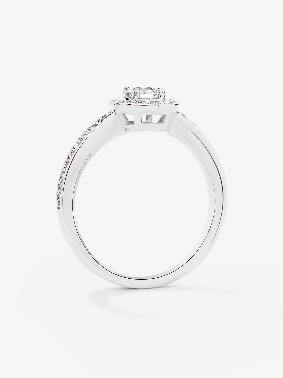 Anillo solitario de compromiso de oro blanco de 18kt con diamante central de 0,40cts