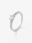 Anillo solitario de oro blanco de 18K con diamante central de 0,3 cts y brazo de 18 diamantes en talla brillante con un total de 0,13 cts