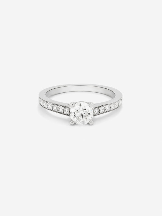 18K White Gold Solitaire Ring with a 0.25ct Central Diamond and Brilliant-Cut Diamonds on the Band