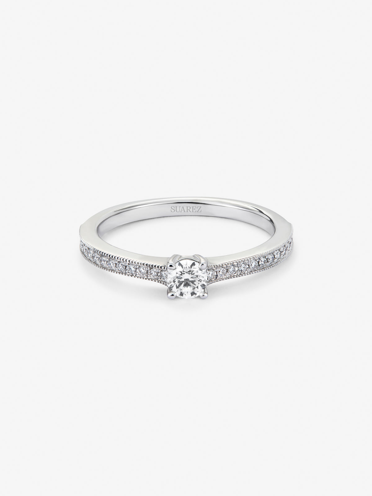 18K white gold solitaire ring with a central brilliant-cut diamond of 0.23 cts and an arm of 29 brilliant-cut diamonds with a total of 0.12 cts