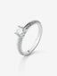 Anillo solitario de oro blanco de 18K con diamante central de 0,70 cts y diamantes en talla brillante con un total de 0,23 cts