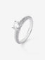 Anillo solitario de oro blanco de 18K con diamante central de 1 ct y diamantes en talla brillante con un total de 0,31 cts