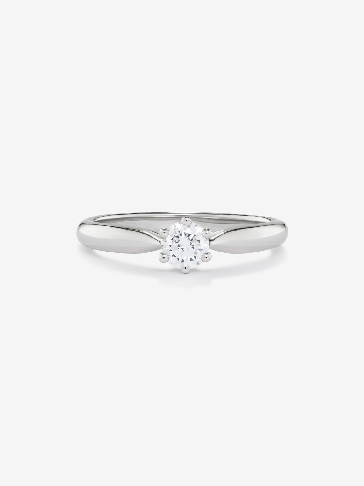 Anillo solitario de compromiso de oro blanco de 18K con diamante central de 0,3 quilates