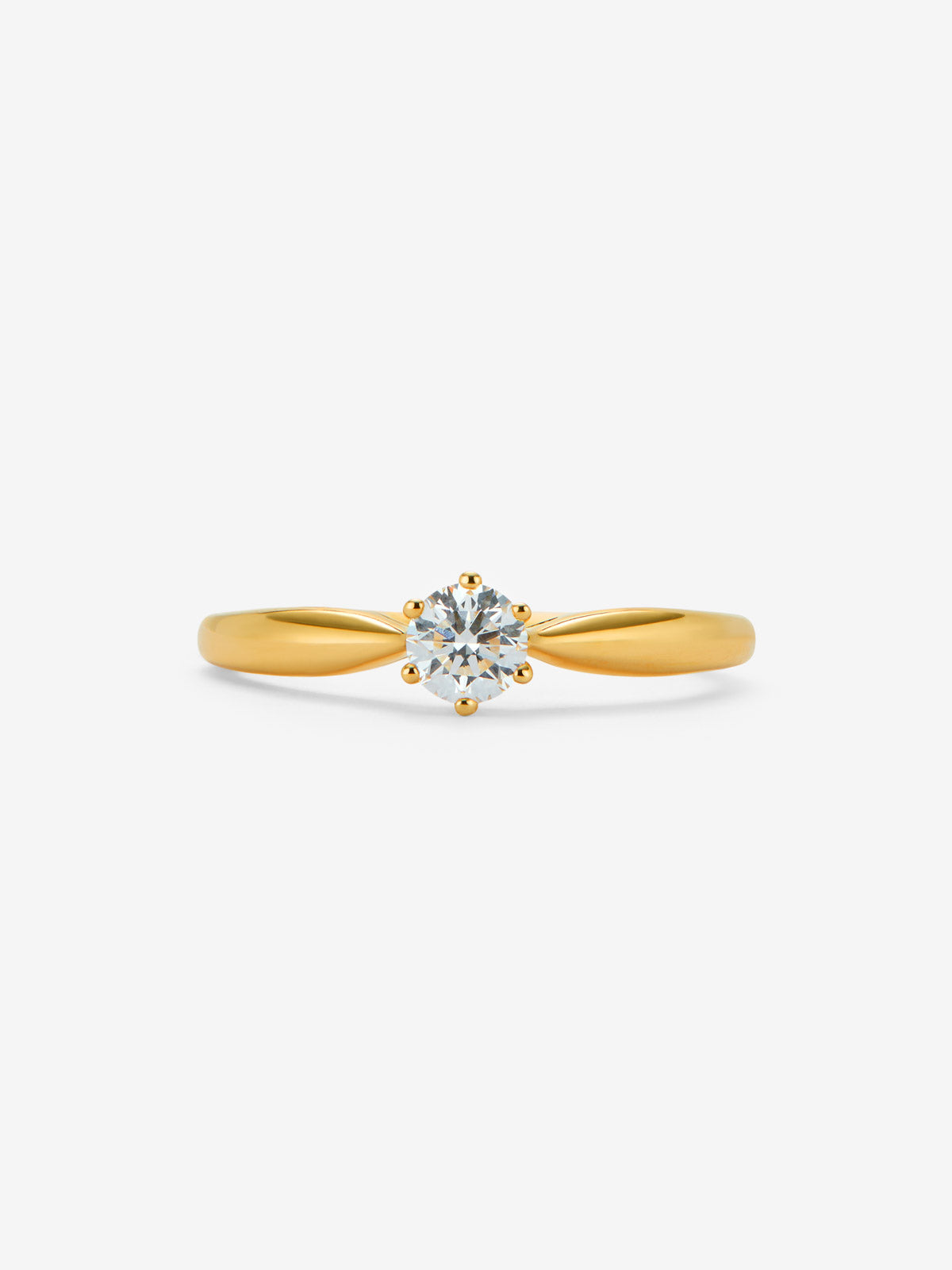 Anillo solitario 3006 de oro amarillo de 18K con diamante en talla brillante de 0,25 cts 