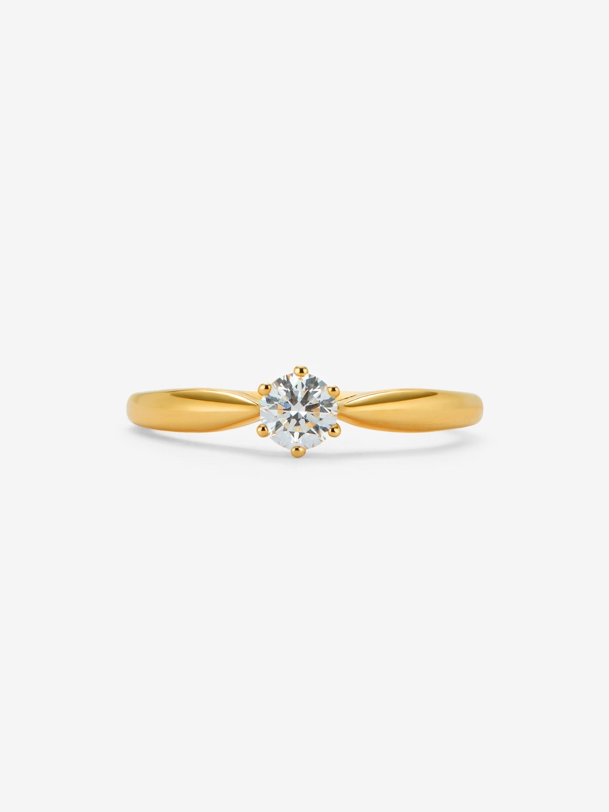Anillo solitario de oro amarillo de 18K con diamante en talla brillante de 0,25 cts
