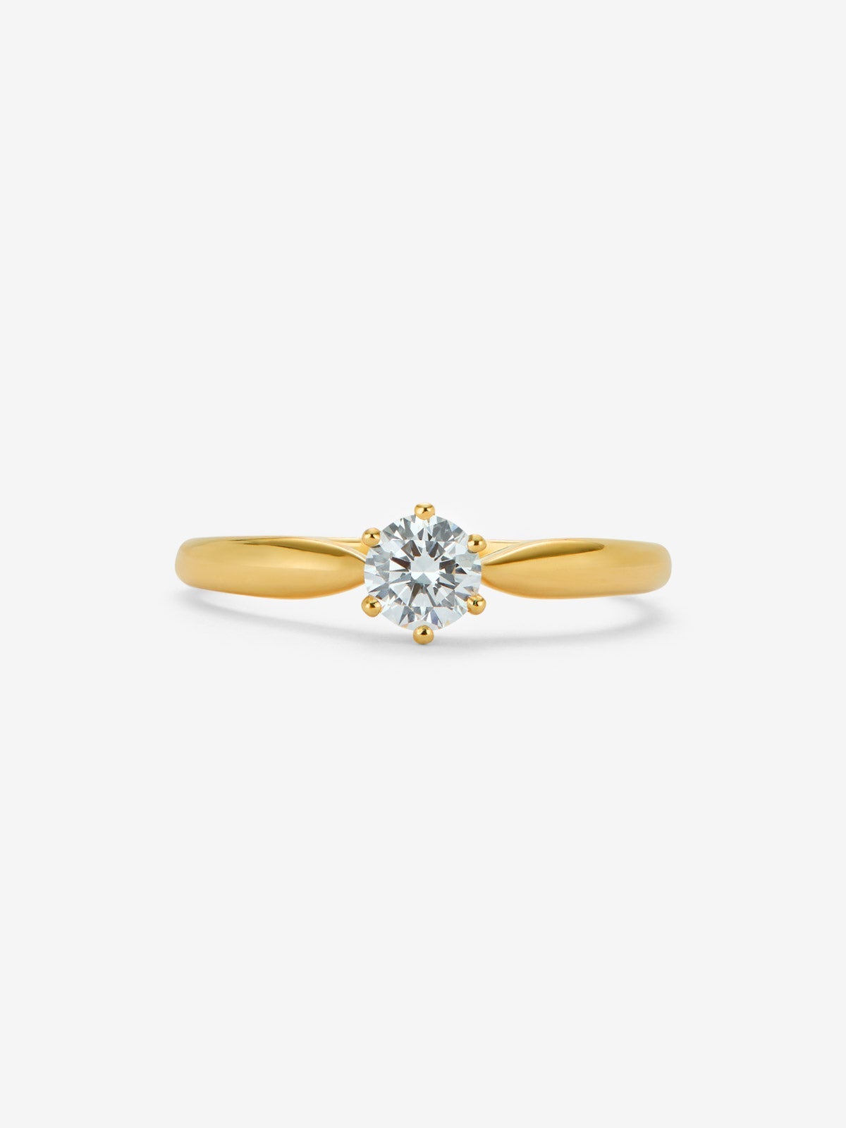 Anillo solitario de oro amarillo de 18K con diamante en talla brillante de 0,3 cts