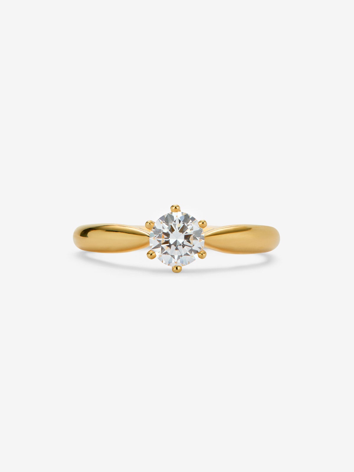 Anillo solitario de oro amarillo de 18K con diamante en talla brillante de 0,3 cts