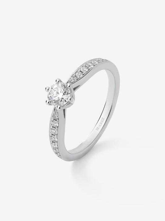 Solitaire ring in 18K white gold with a central 0.40-carat brilliant-cut diamond and additional diamonds totaling 0.19 cts