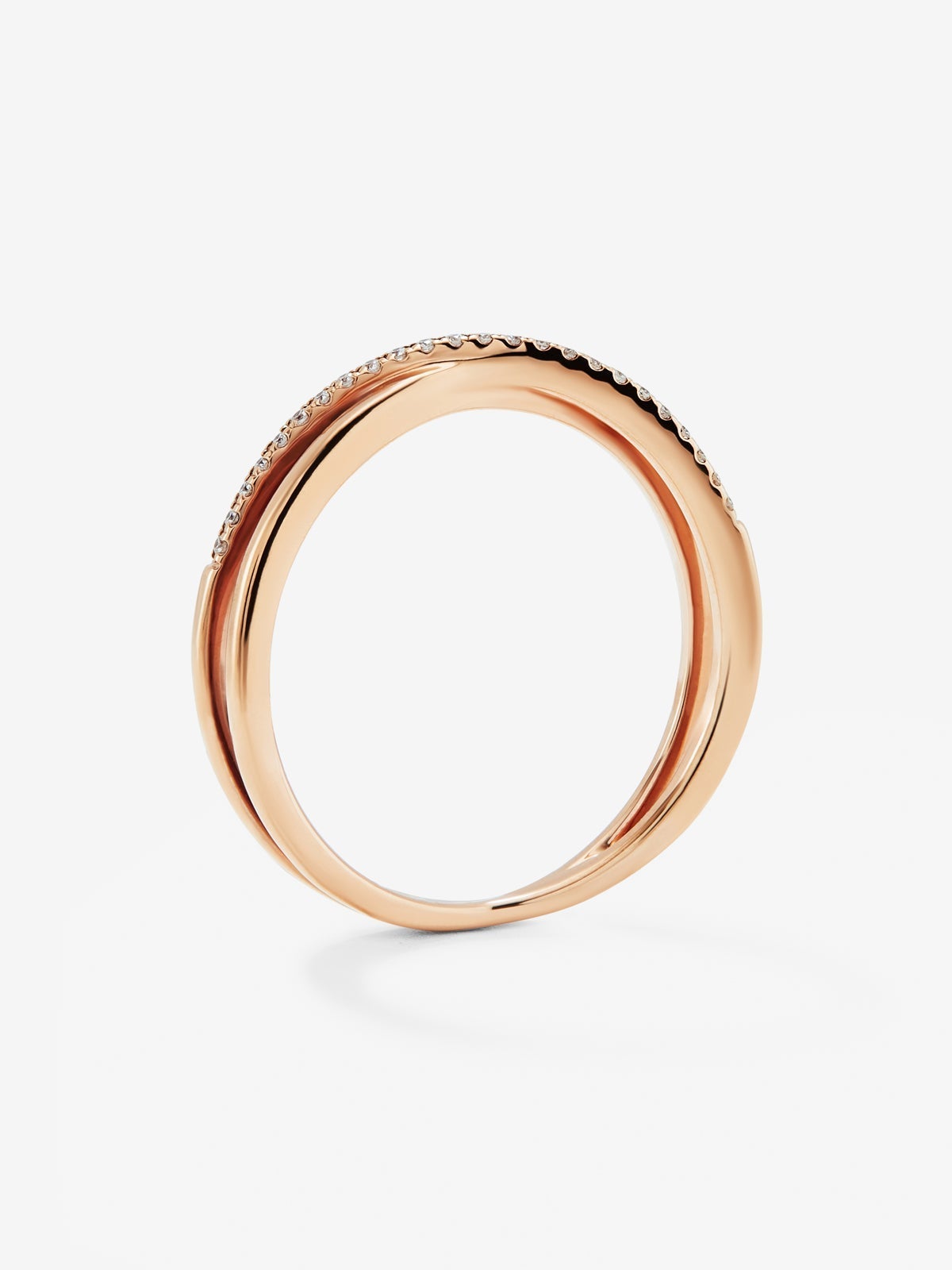 Anillo cruzado de oro rosa de 18K con 24 diamantes blancos en talla brillante con un total de 0,07 cts