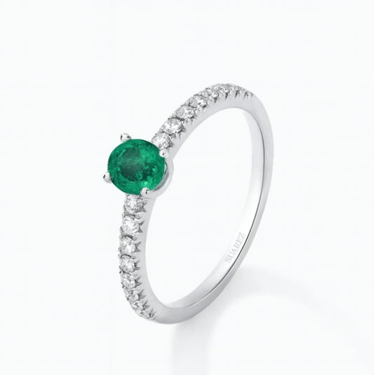 Anillo de oro blanco 18K con esmeralda