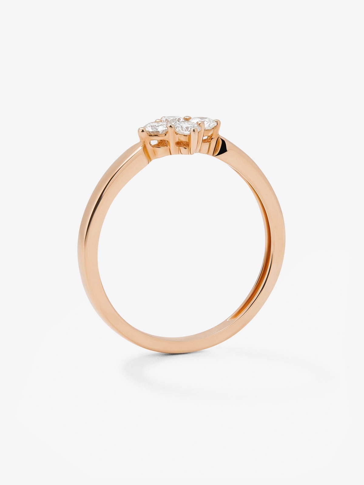 Anillo de oro rosa de 18K con 4 diamantes en talla brillante con un total de 0,25 cts