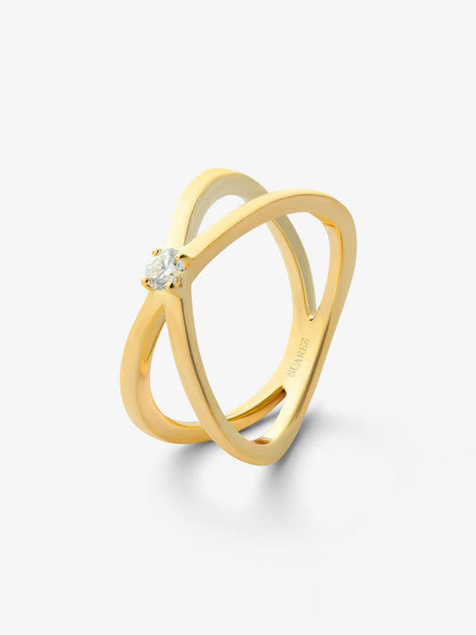 Anillo cruzado de oro amarillo de 18K con diamante en talla brillante de 0,12 cts