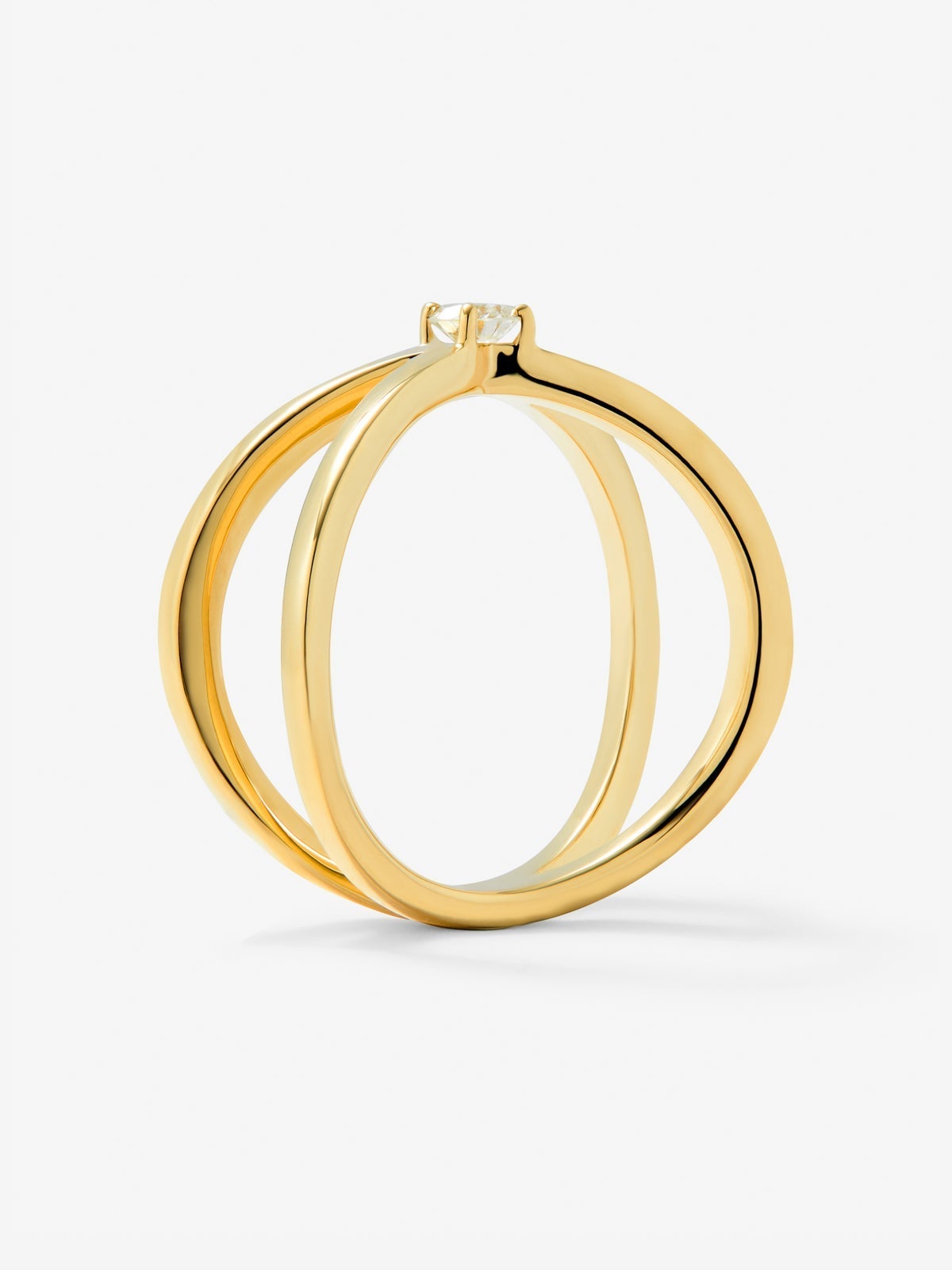 Anillo cruzado de oro amarillo de 18K con diamante en talla brillante de 0,12 cts