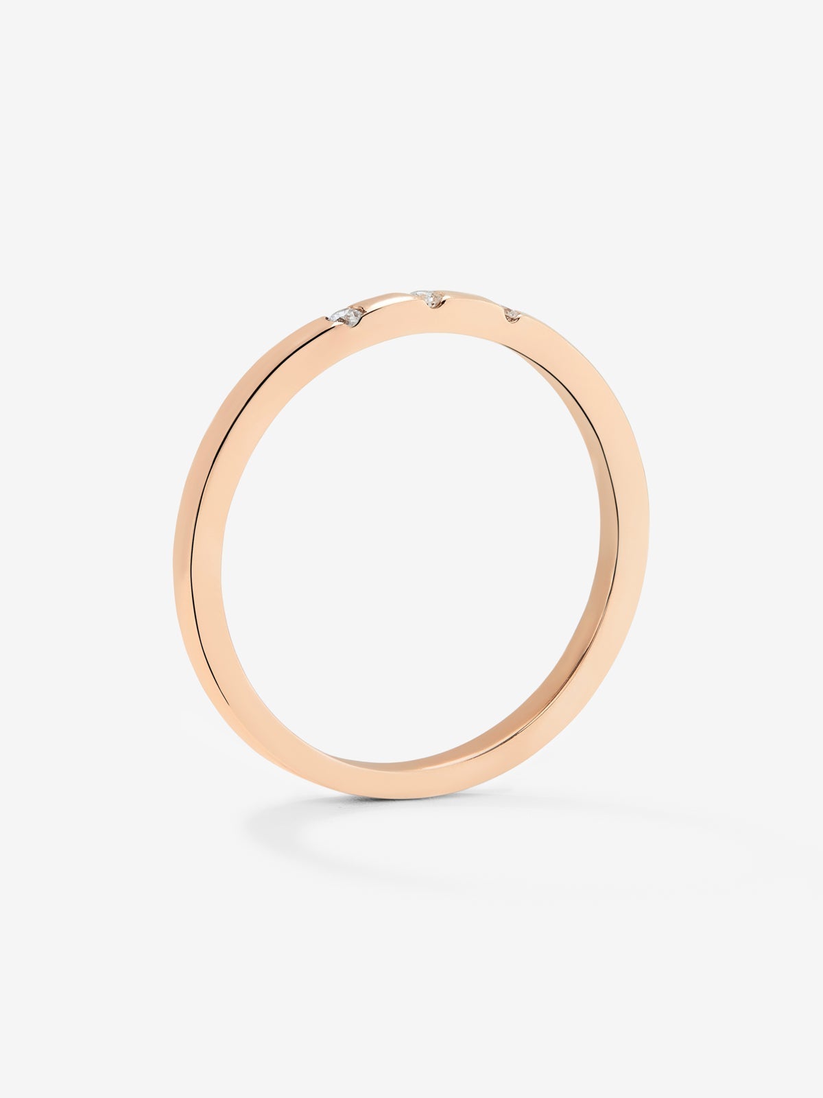 Anillo de oro rosa de 18K con 3 diamantes en talla brillante con un total de 1,4 cts