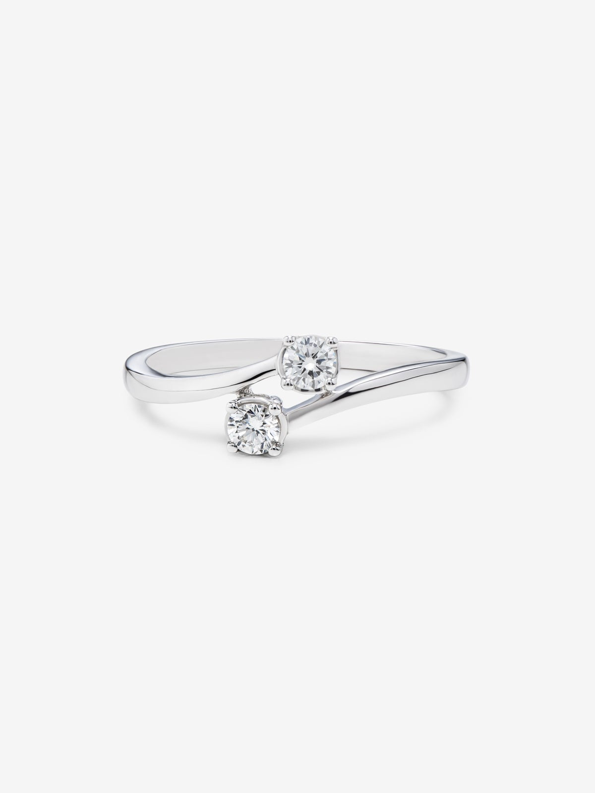 Anillo tú y yo de oro blanco de 18K con 2 diamantes en talla brillante con un total de 0,19 cts