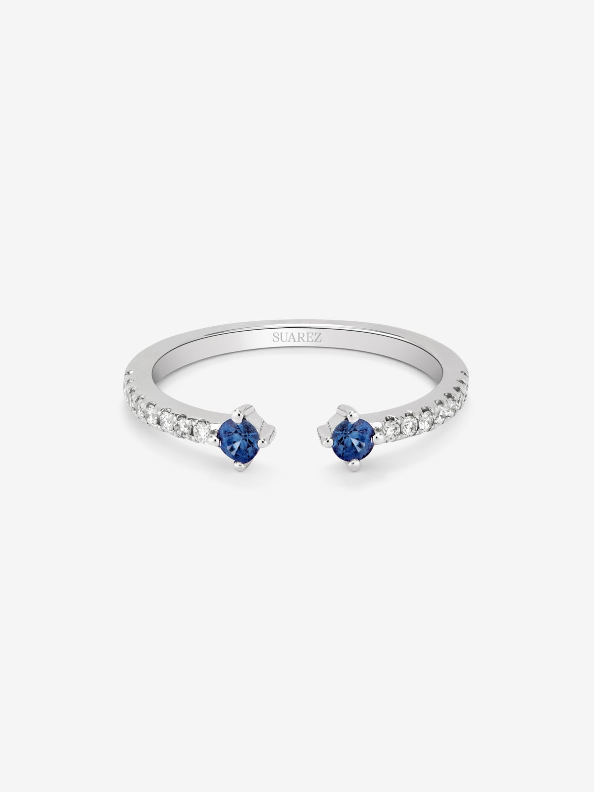 Anillo abierto de oro blanco de 18K con zafiro y diamante